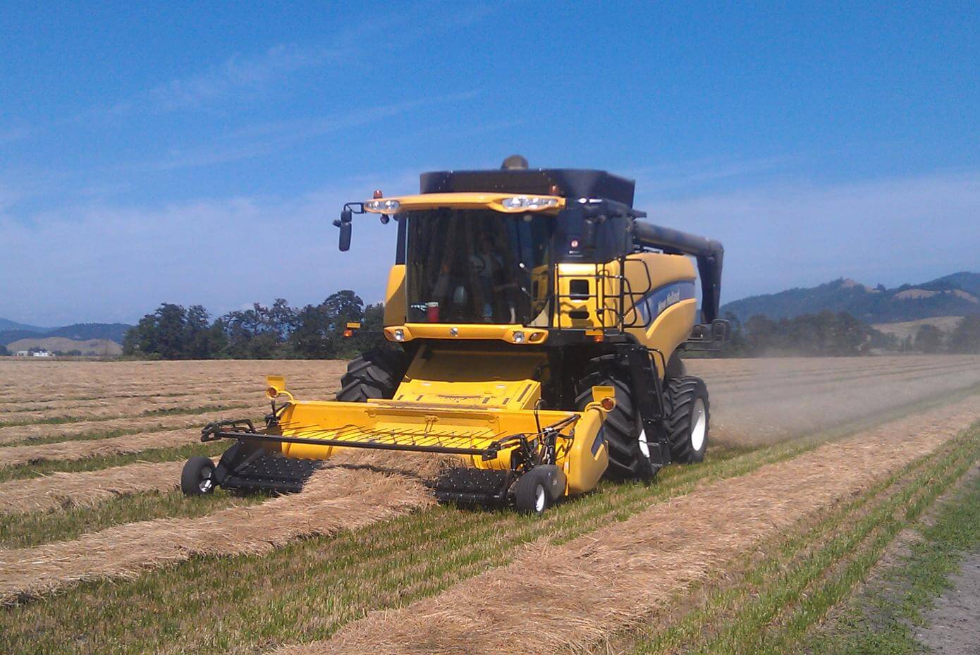 Tractor harvesting seed